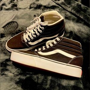 Vans Black and White High Tops